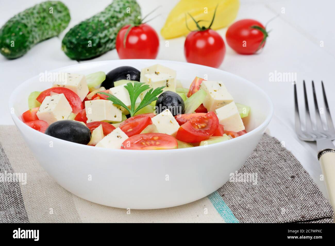 Close up of vegetables salad with cheese in a bowl Stock Photo