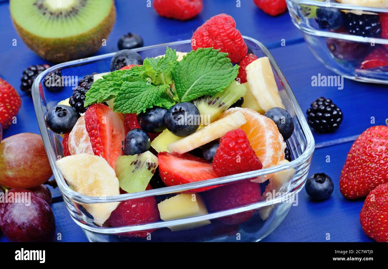 Fruit salad banana kiwi strawberry hi-res stock photography and images ...