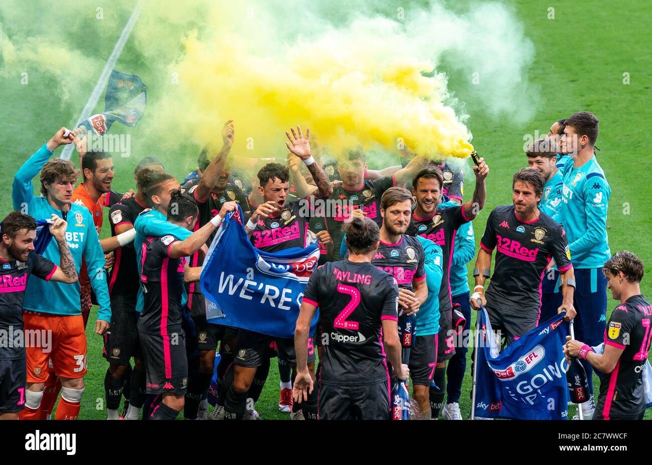 Derby, UK. 19th July, 2020. Leeds United players celebrate with a yellow flare during the Sky Bet Championship match between Derby County and Leeds United at the Ipro Stadium, Derby, England. Football Stadiums around remain empty due to the Covid-19 Pandemic as Government social distancing laws prohibit supporters inside venues resulting in all fixtures being played behind closed doors until further notice on 19 July 2020. Photo by Andy Rowland. Credit: PRiME Media Images/Alamy Live News Stock Photo