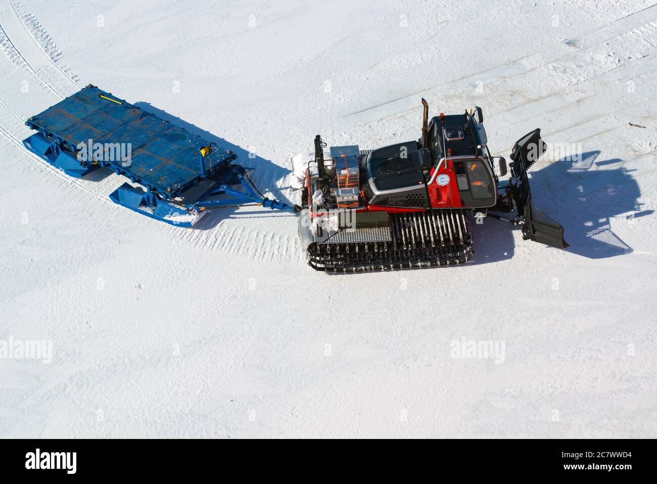 A special sled tractor with wide tracks for long distance transport. Special equipment. Antarctic Stock Photo
