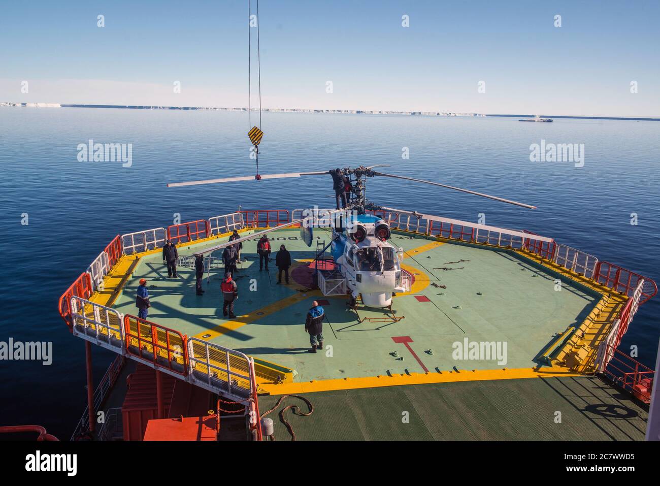 View of the deck from the captain's cabin on the ice drift Akademik Fedorov. Antarctica view of ice, open water, equipment unloading. Stock Photo