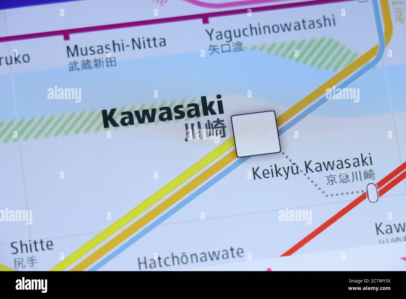 Kawasaki Station on Tokyo subway map on smartphone screen. Stock Photo