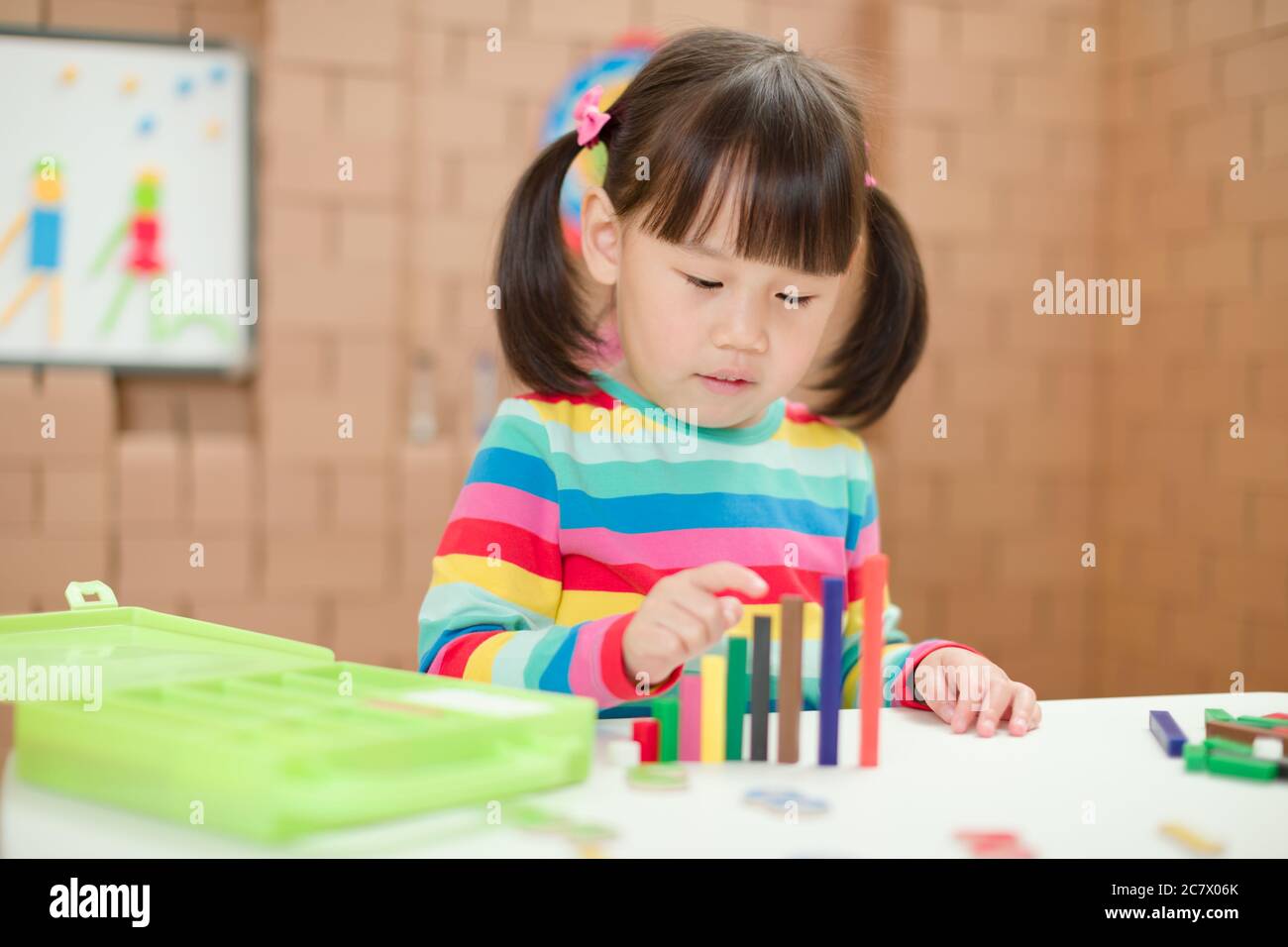 Toddler Girl Play Number Sticks For Homeschooling Stock Photo Alamy