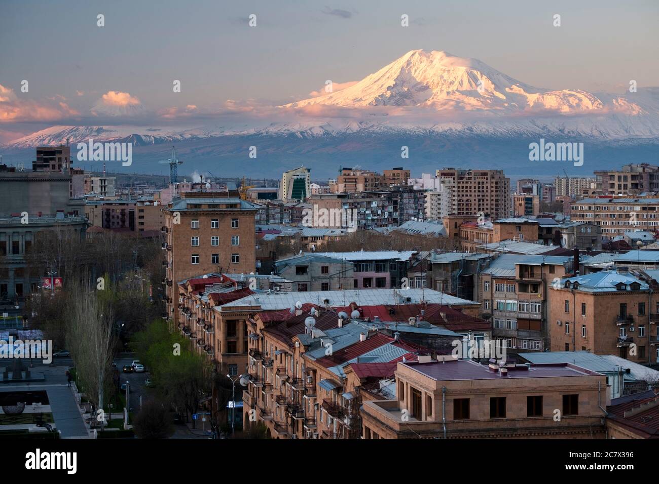 Dawn on the snowy peak of Mount Ararat over the city of Yerevan, Armenia Stock Photo