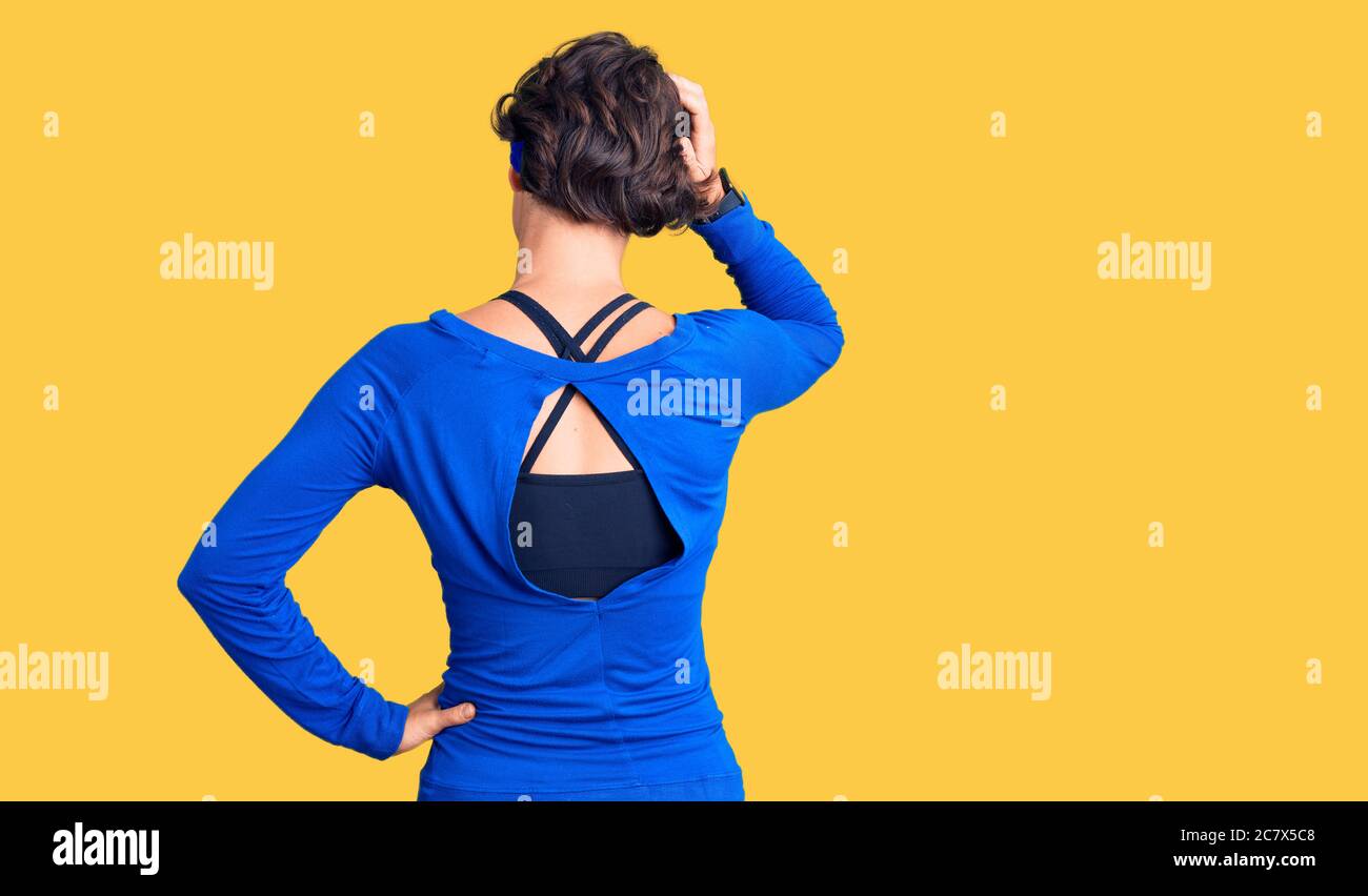 Athlete female rear view hands on head hi-res stock photography and ...