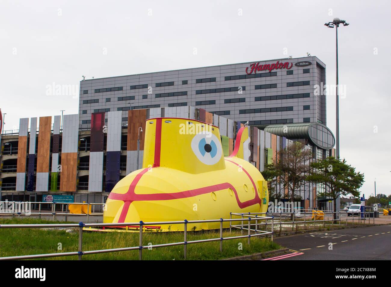 8 july 2020 The famous life size sculpture of the Yellow Submarine so called after the famous Beatles song and now located at the John Lennon Airport Stock Photo