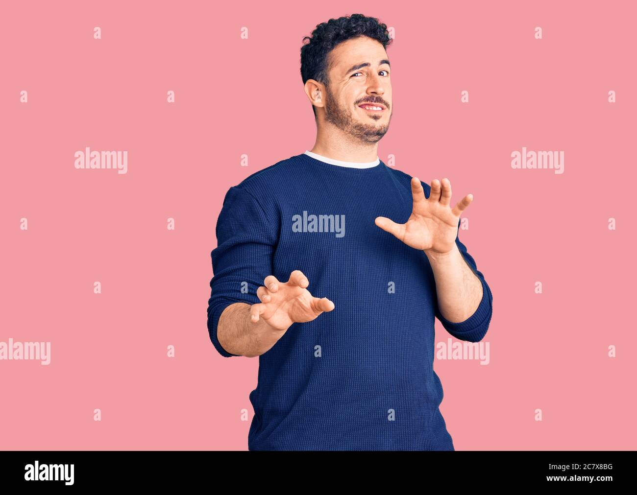 Young hispanic man wearing casual clothes disgusted expression ...