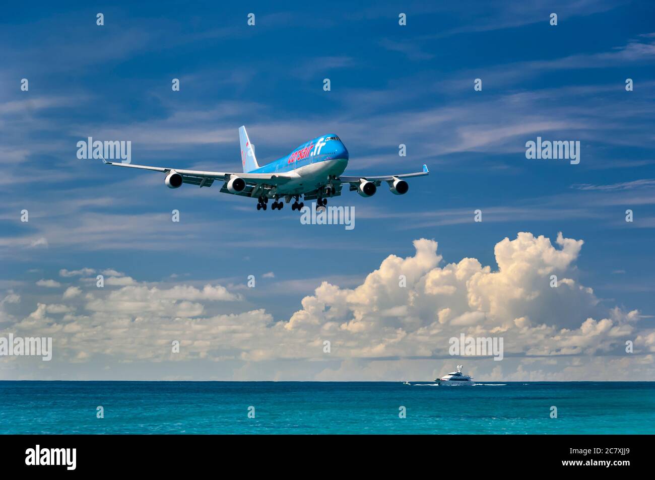 A Corsair Boeing 747 landing at Saint Maarten, airport, Caribbean, West Indies. Stock Photo