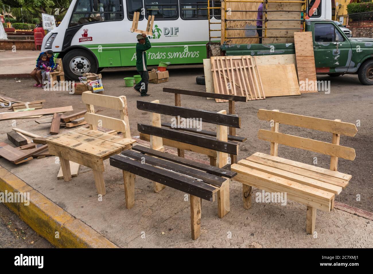 Furniture made from recycled lumber for sale at the market in Muna