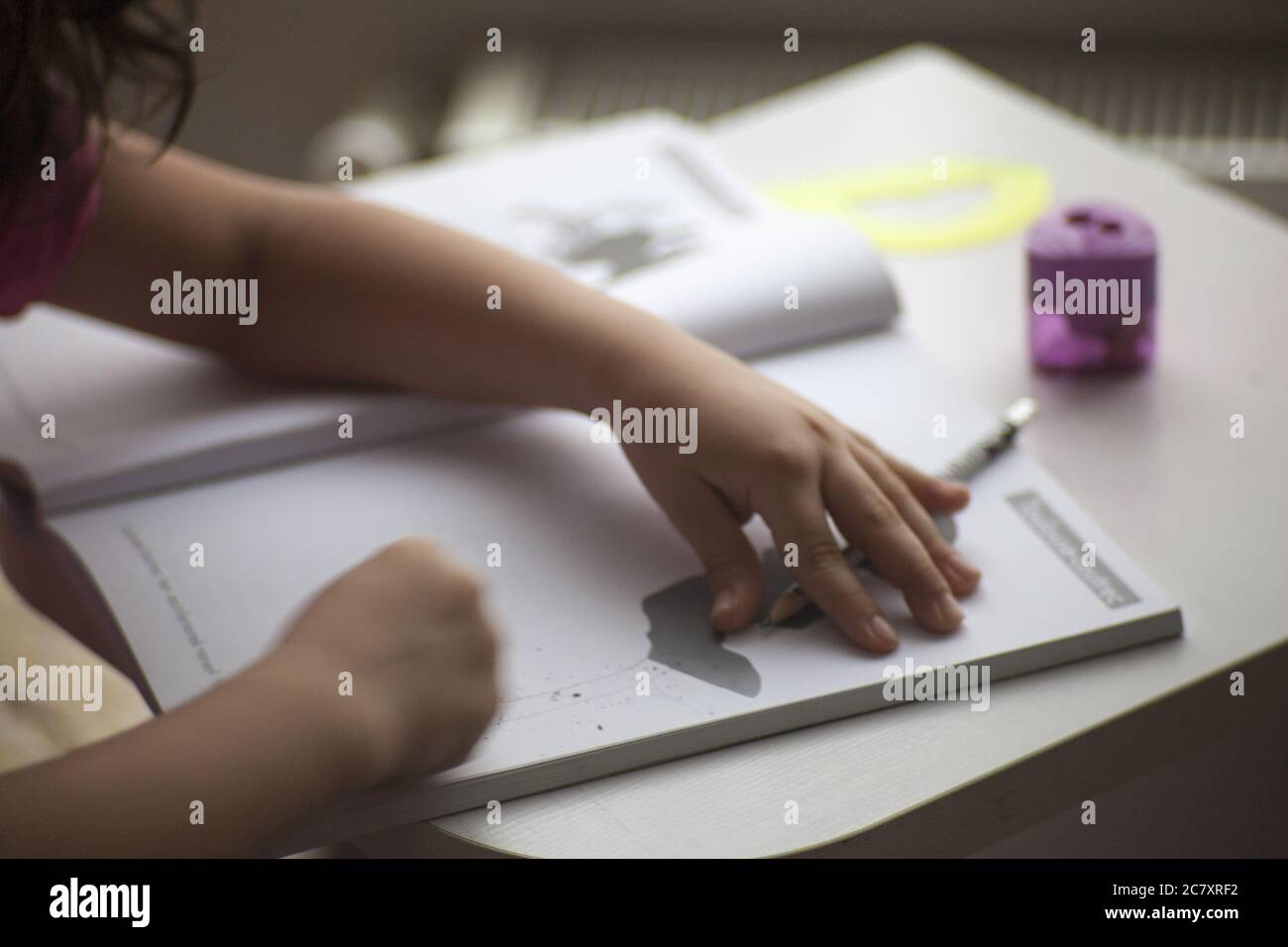 Child writing classroom ruler hi-res stock photography and images - Alamy