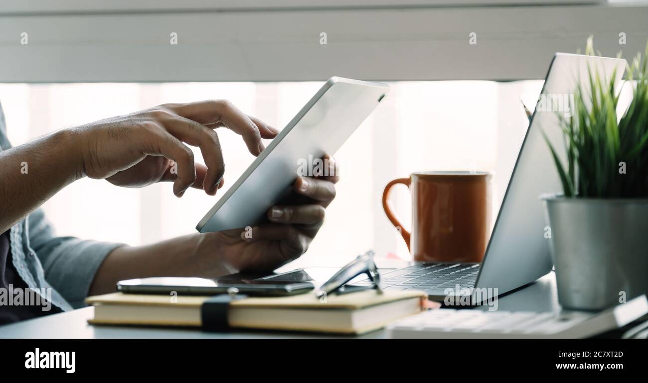 Business man using digital pad hi-res stock photography and images - Alamy
