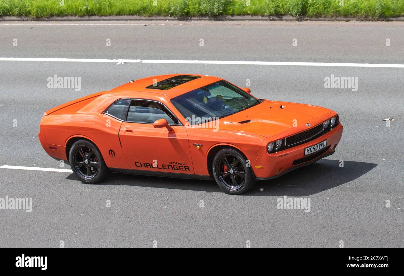 2010 Dodge Challenger USA Vehicular traffic moving vehicles, American cars driving vehicle on UK roads, motors, motoring on the M6 motorway highway network. Stock Photo