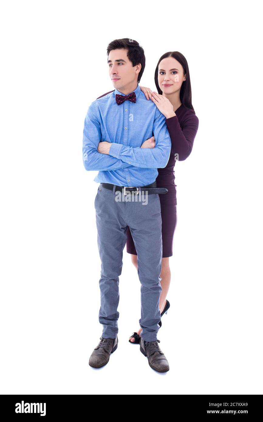 full length portrait of young pretty couple isolated on white ...
