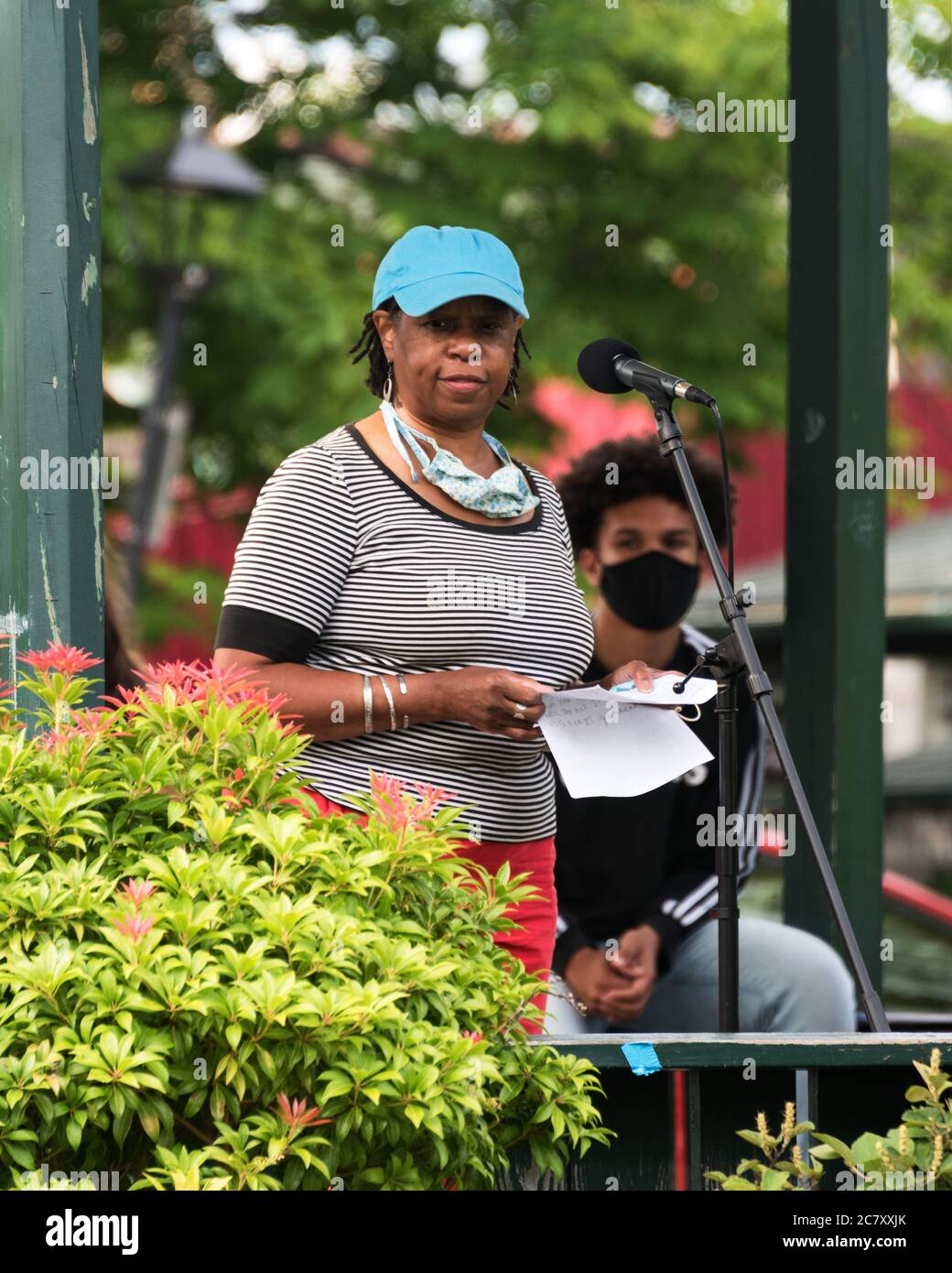 Bar Harbor, Maine. July 19, 2020. Cas Dowden reads the Preamble to the Constitution at the MDI Racial Justice Coalition rally. Stock Photo