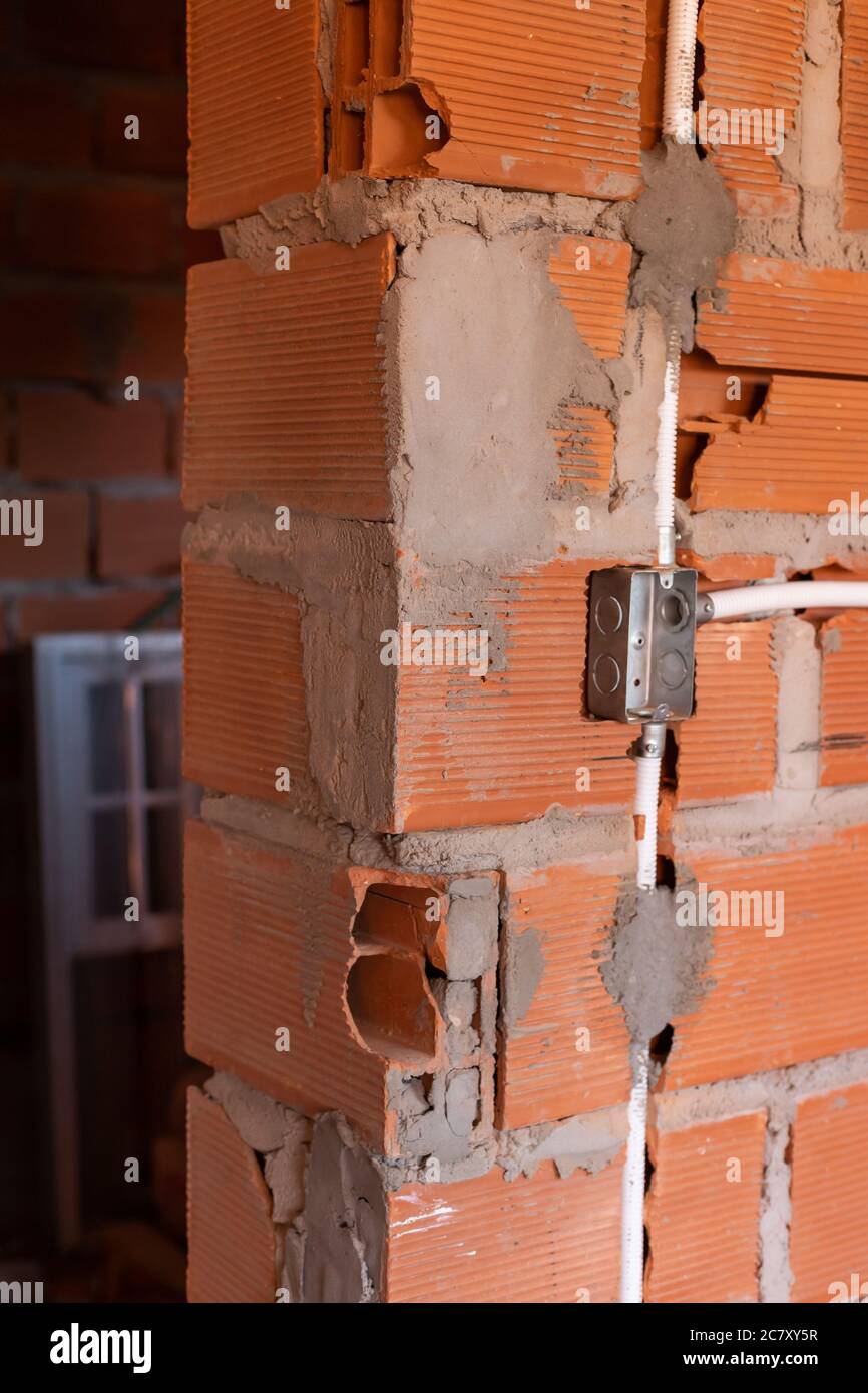 Electrical socket arrangement on a wall in a construction site Stock ...