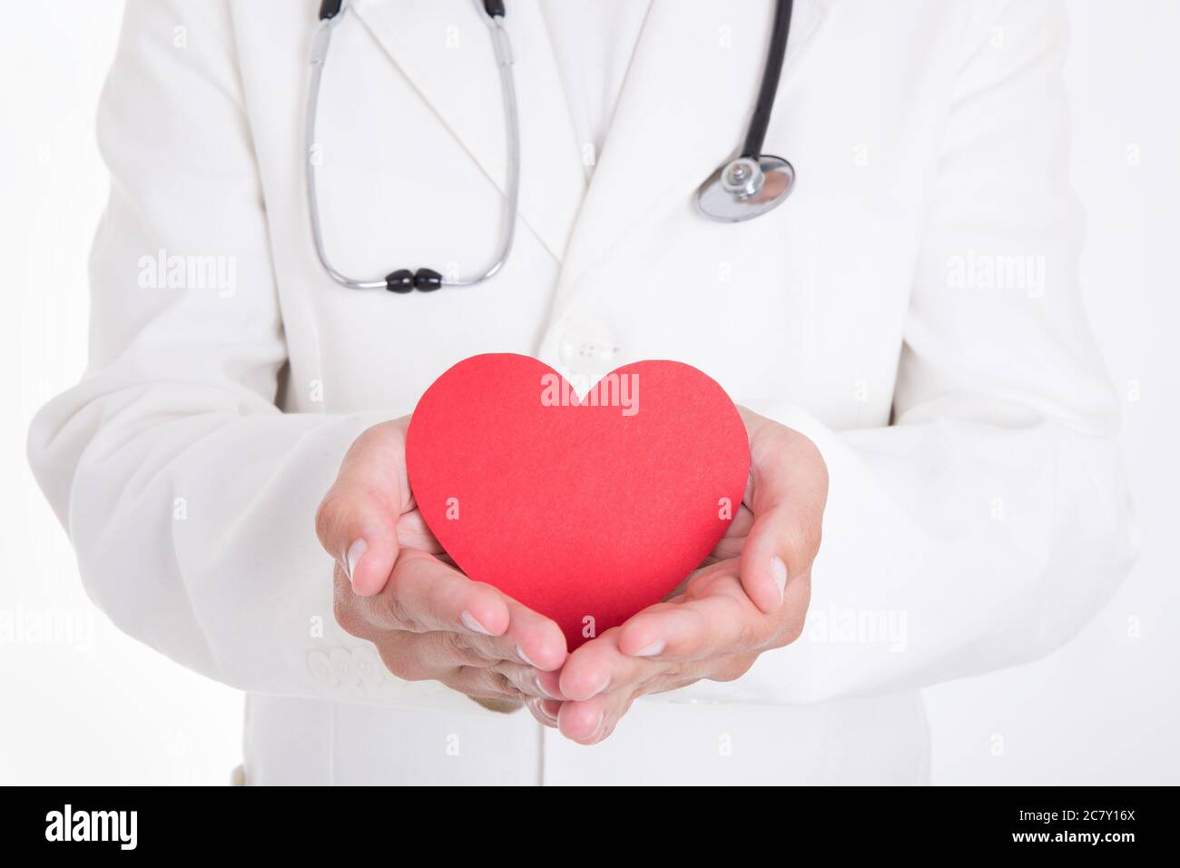 health care concept - doctor holding red heart isolated on white ...