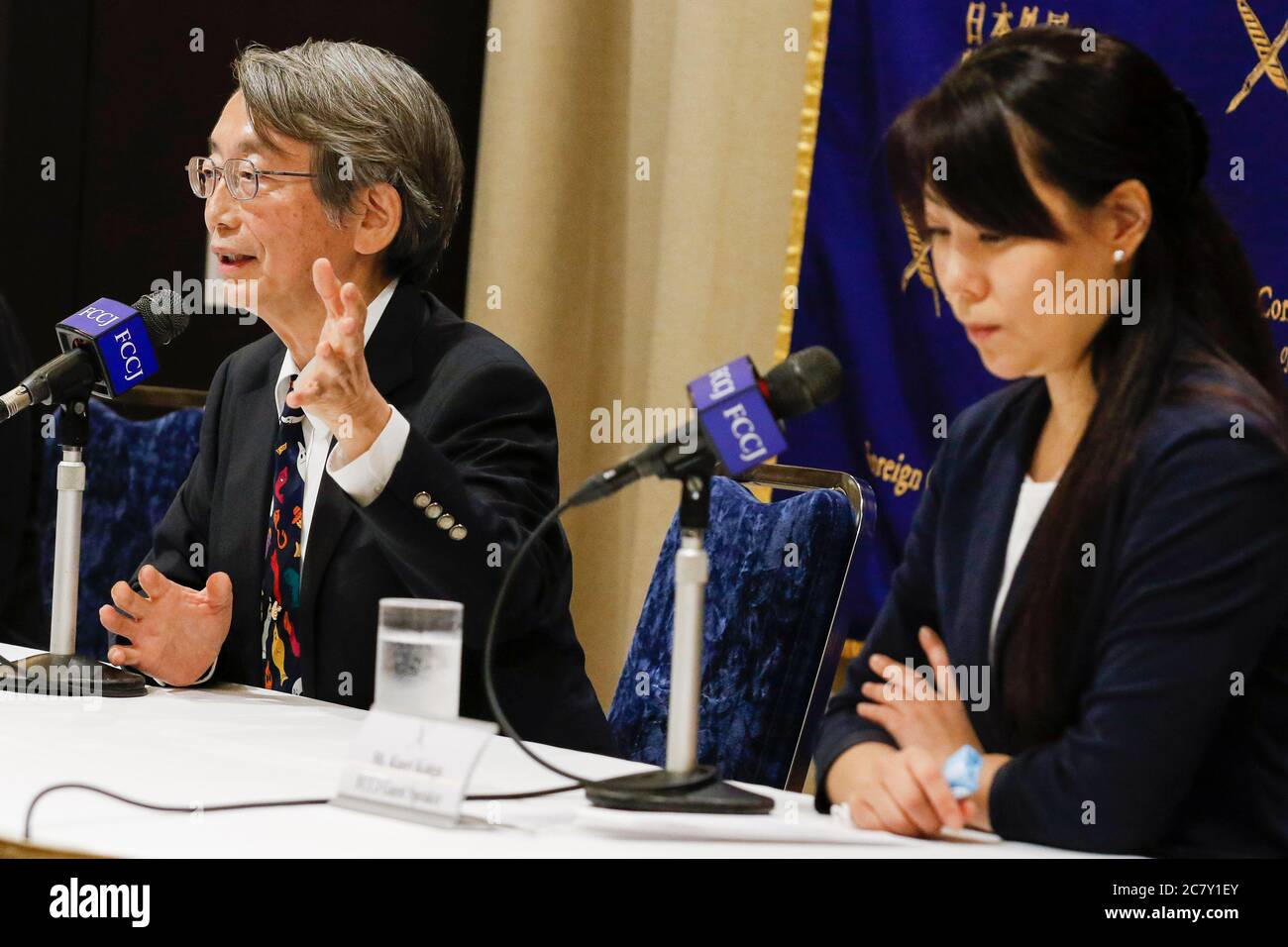 (L to R) Dr. Shinya Iwamuro urologist and public health advocate and Kaori Kohga head of the Nightlife Business Association, speak during a news conference at The Foreign Correspondents' Club of Japan (FCCJ) on July 20, 2020, Tokyo, Japan. Kohga, who is representing hostess workers and clubs across Japan, came to the Club alongside Dr. Iwamuro to talk about the challenges of nightlife workers amid coronavirus pandemic, in which recent infection cases have been rises among people in their 20s and 30s. Credit: Rodrigo Reyes Marin/AFLO/Alamy Live News Stock Photo
