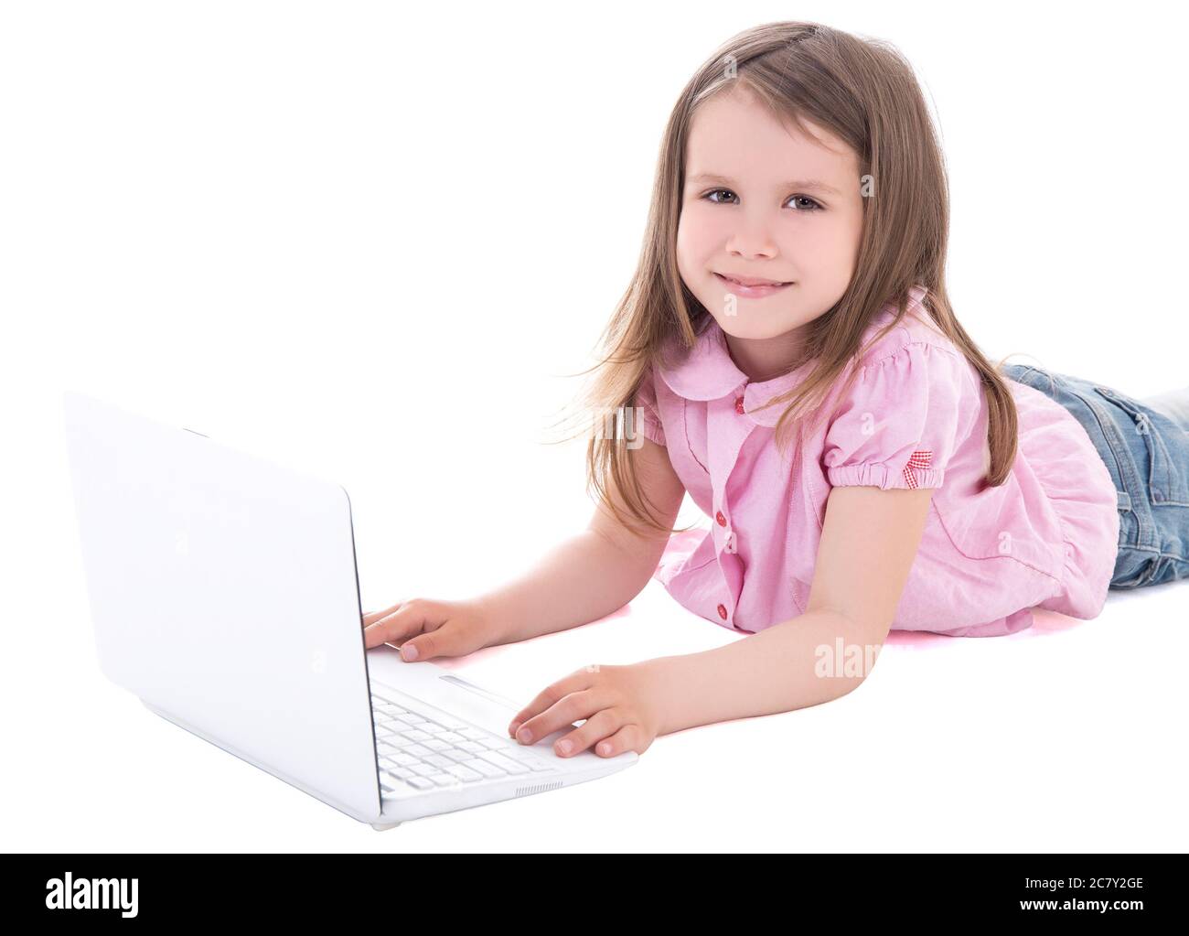 happy cute little girl using laptop isolated on white background Stock ...