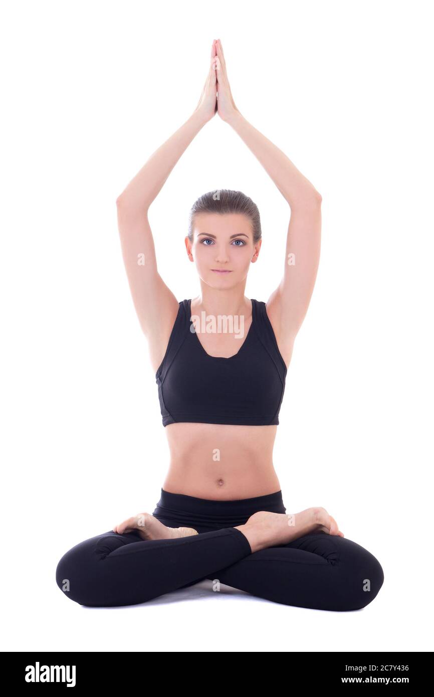 yoga - young beautiful woman sitting in lotus pose isolated on white ...