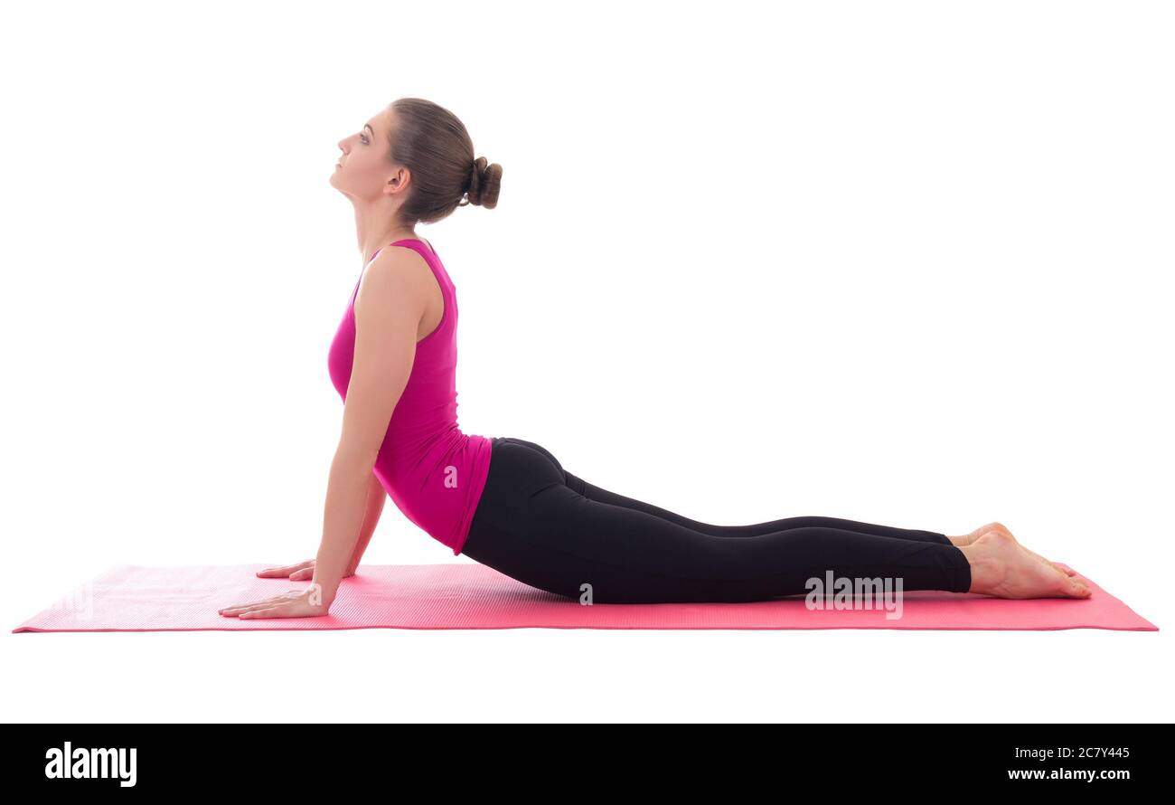 young slim woman doing stretching exercise on yoga mat isolated on ...