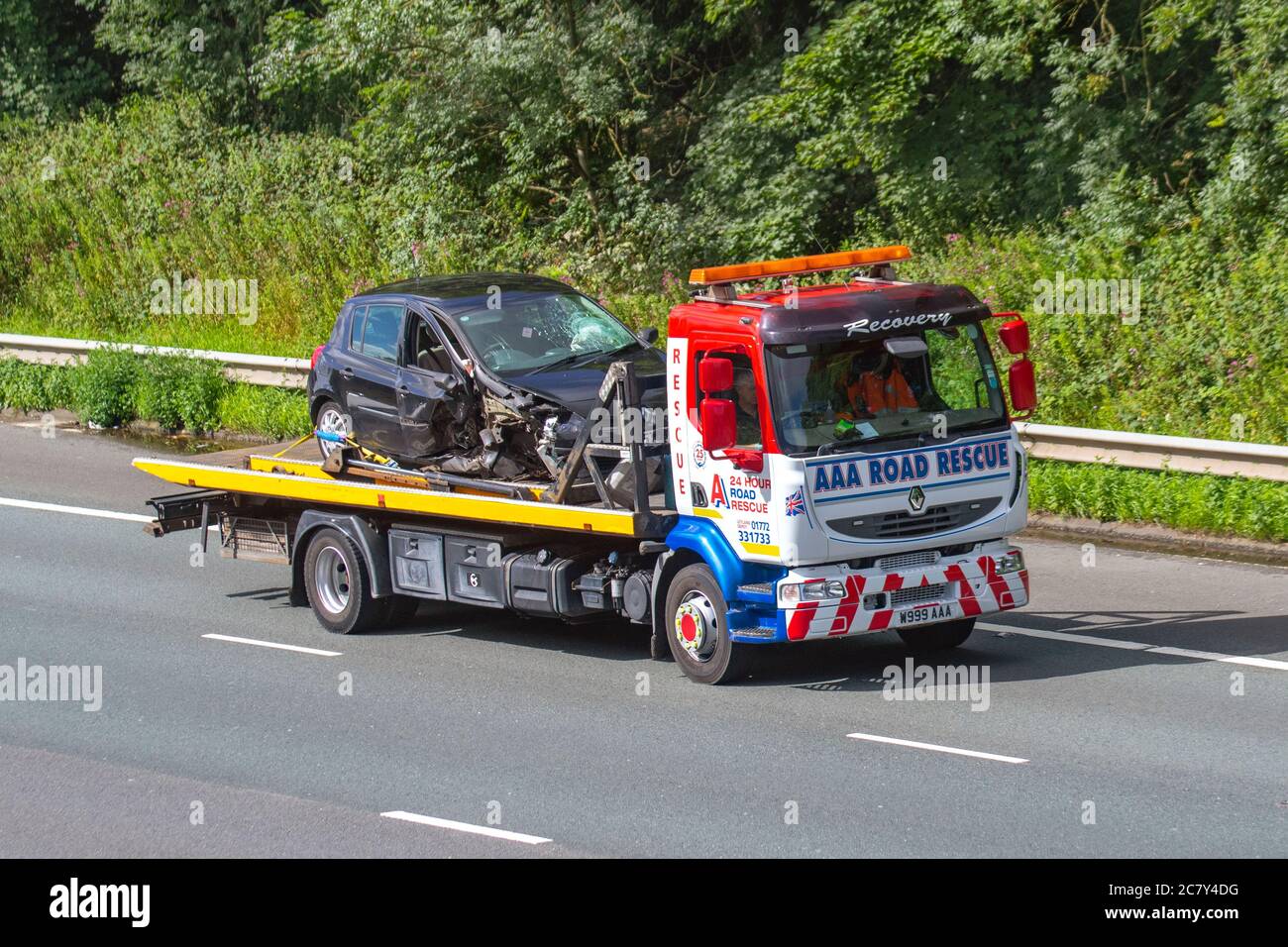 AAA Road Rescue (Leyland).  24 hr accident and breakdown recovery services. Renault Road Rescue,  24 hour roadside breakdown service. Haulage delivery trucks, lorry, transportation, truck, AUTO carrier, Renault  vehicle, European commercial transport, industry, M6 at Manchester, UK Stock Photo
