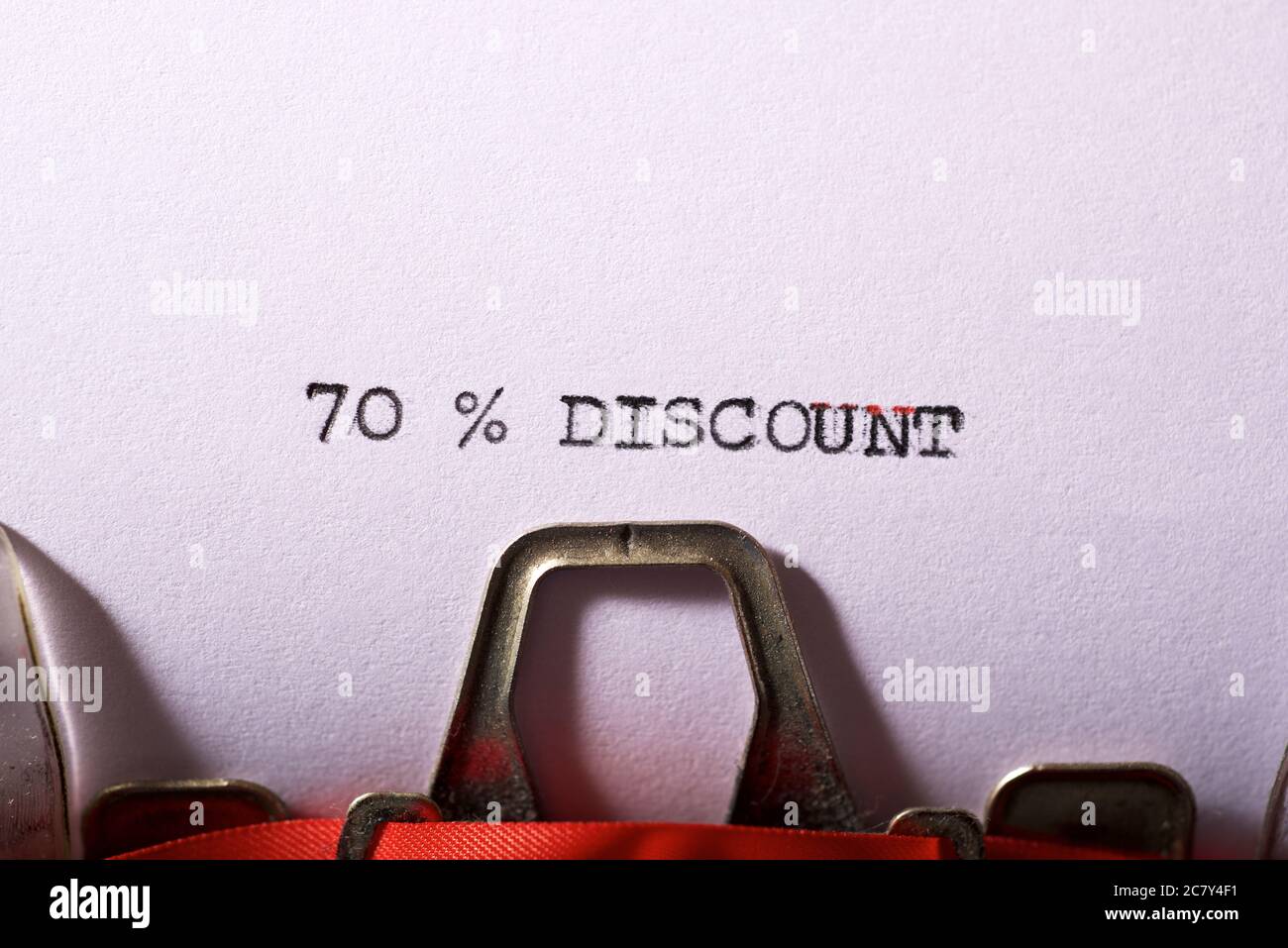 70 % discount text written on a paper. Stock Photo