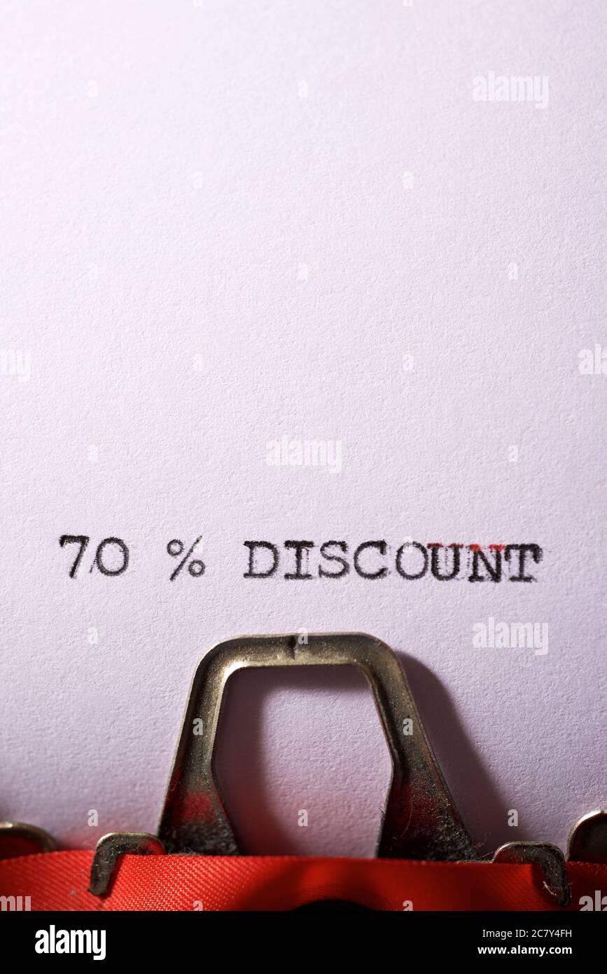 70 % discount text written on a paper. Stock Photo