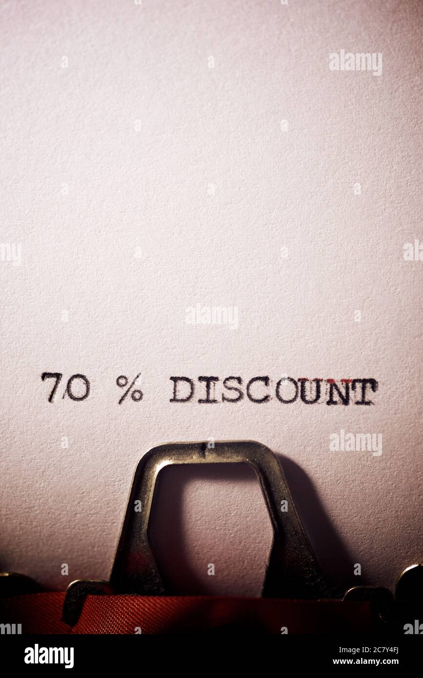 70 % discount text written on a paper. Stock Photo