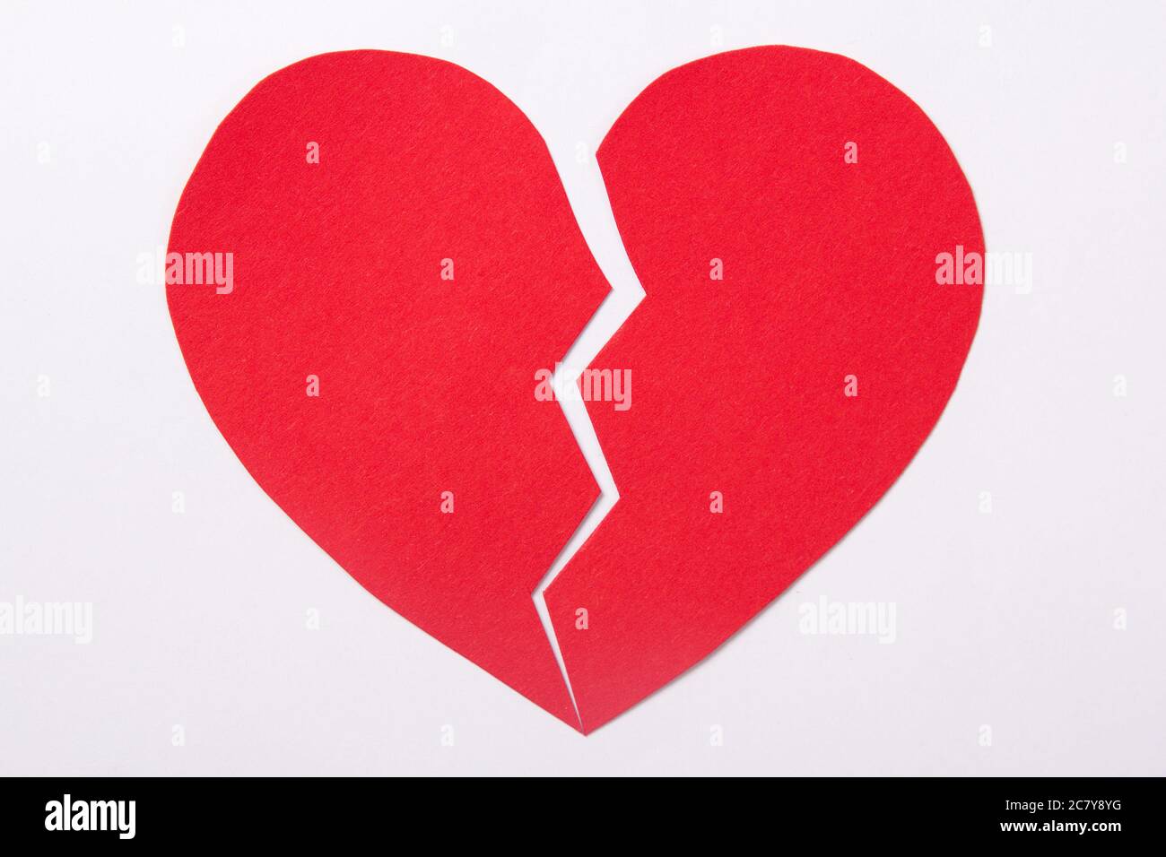 love concept - red paper broken heart over white background Stock Photo ...