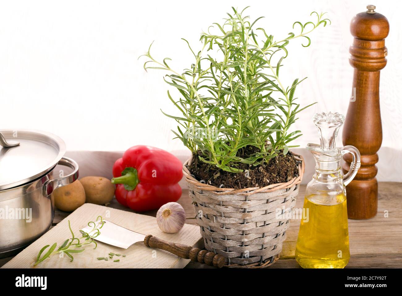 Fresh rosemary and vegetables in the kitchen Stock Photo Alamy