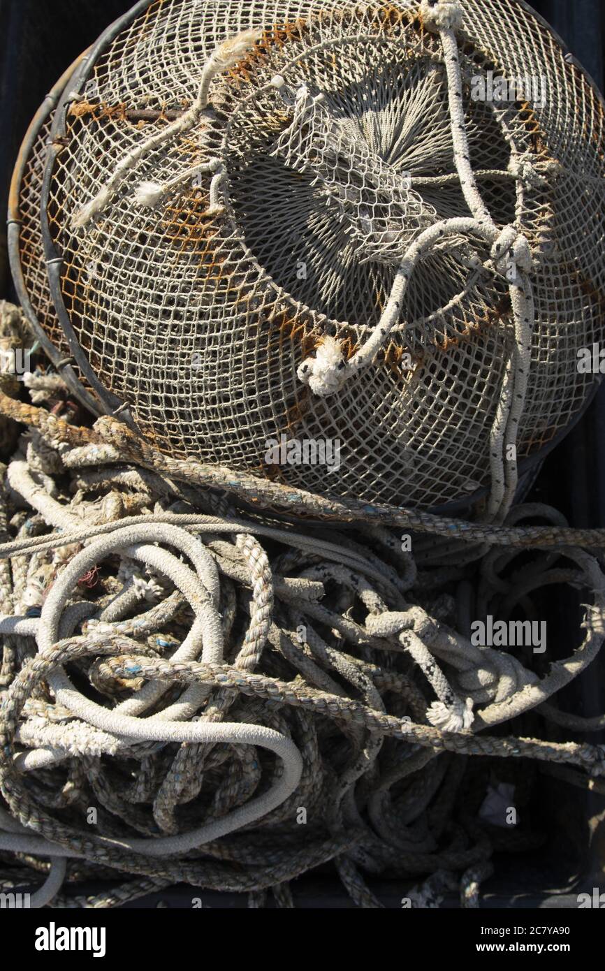 Some messy equipment, ropes, nets and floats arranged for fishing Stock ...
