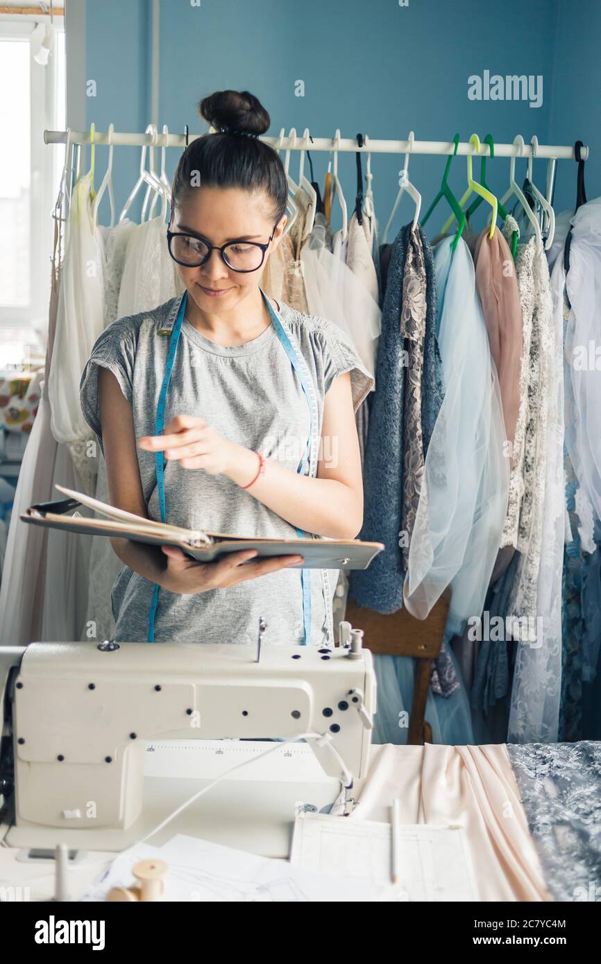 Choosing from cloth samples hi-res stock photography and images - Alamy