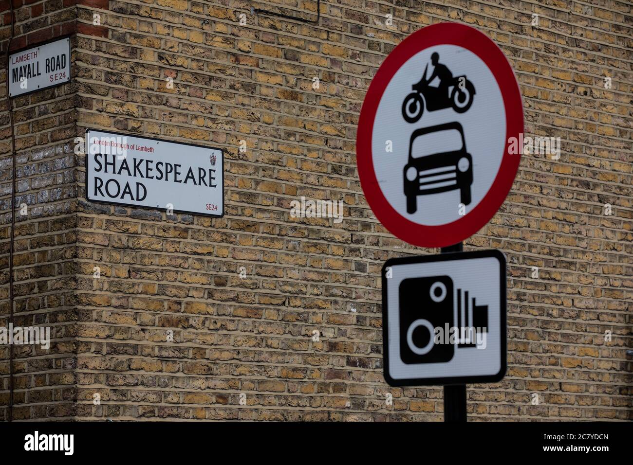 London road blocks to restrict traffic in place to create 'cycle highways' and encourage cycling & cut air pollution on Shakespeare Road, Lambeth SE24 Stock Photo