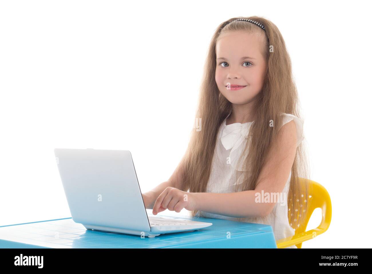 beautiful little girl using laptop isolated on white background Stock ...