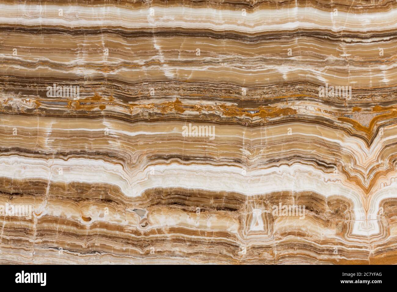 Beige natural stone, onyx. Seamless square texture, tile ready. Stock Photo