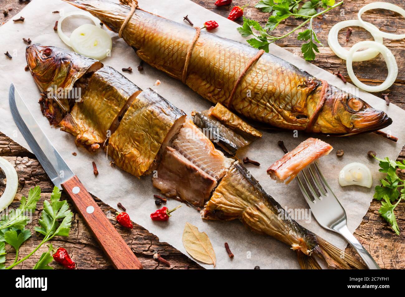 Smoked herring with herbs and spices Stock Photo Alamy