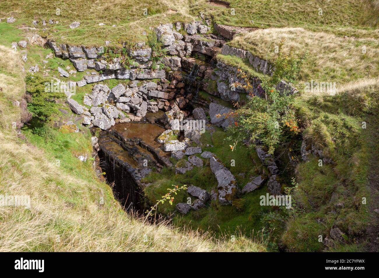 The entrance of Hunt Pot on the flanks of PenyGhent, Yorkshire Dales