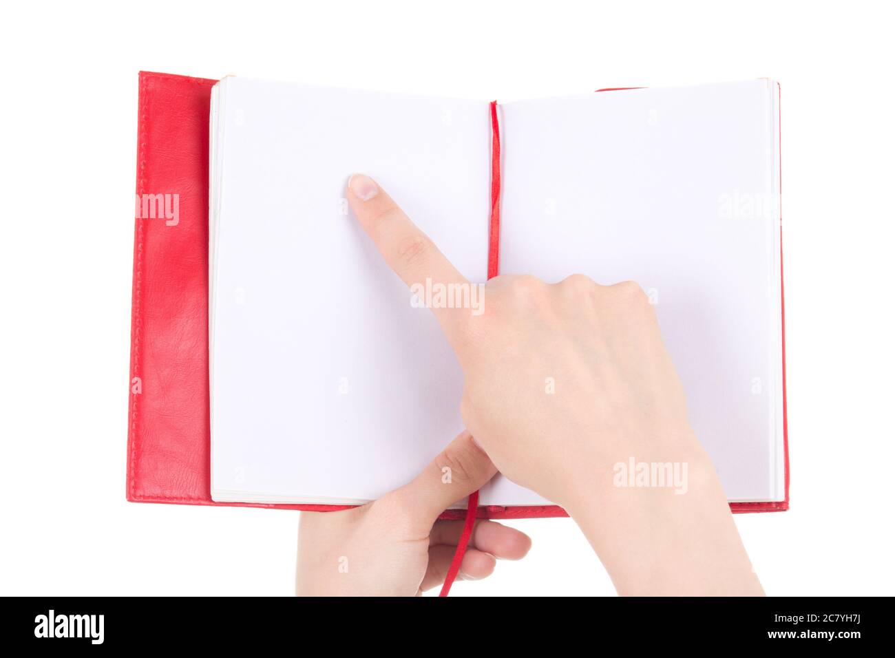 female hand pointing in blank notebook isolated on white background ...
