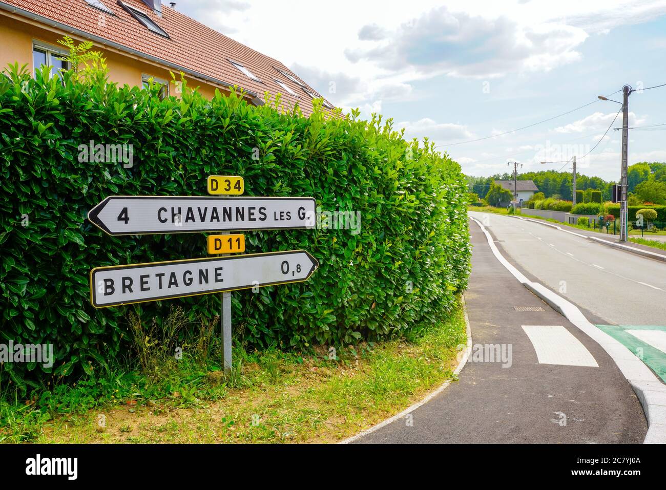 Road sign to village Bretagne. Bretagne is a commune in the Territoire de Belfort department in Bourgogne-Franche-Comté in northeastern France. Stock Photo