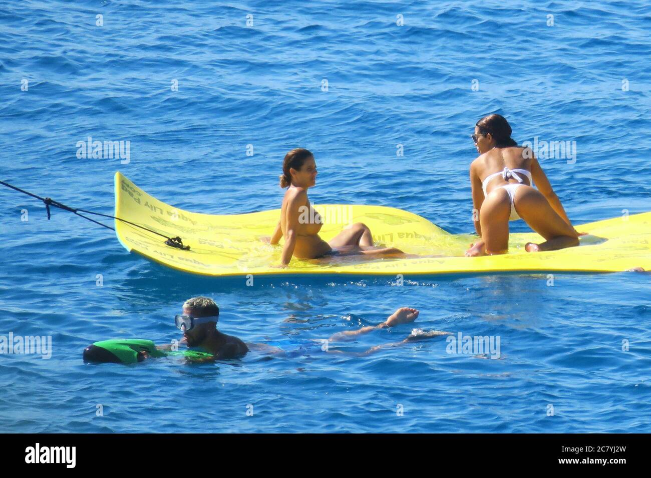 Formentera, Spain. 19th July, 2020. Tamara Gorro and Ezequiel Garay relax on the boat. Credit: Independent Photo Agency/Alamy Live News Stock Photo