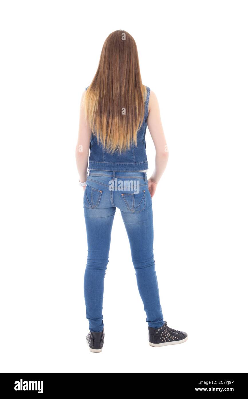 back view of teenage girl in jeans clothes isolated on white background Stock Photo