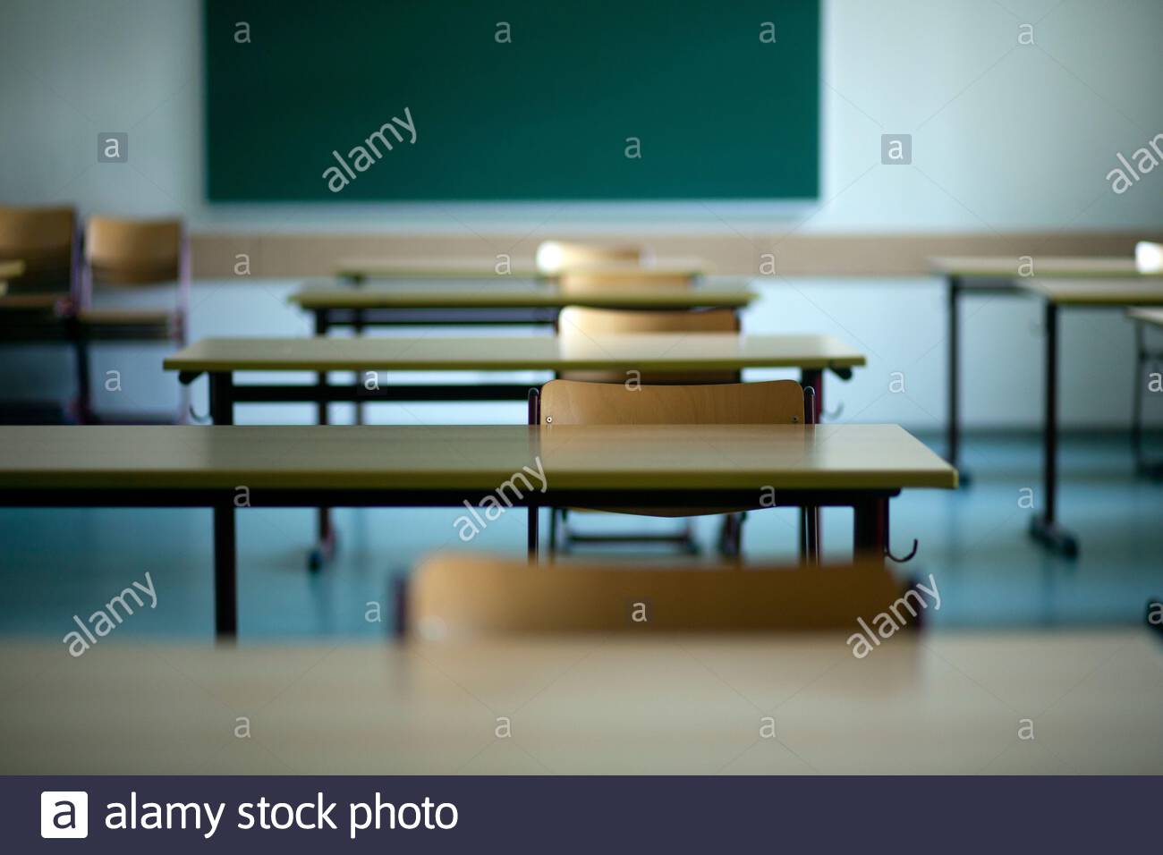 Empty school furniture in a German classroom as the summer holidays begin.Uncertainty surrounds the reopening of schools in September due to Covid 19. Stock Photo