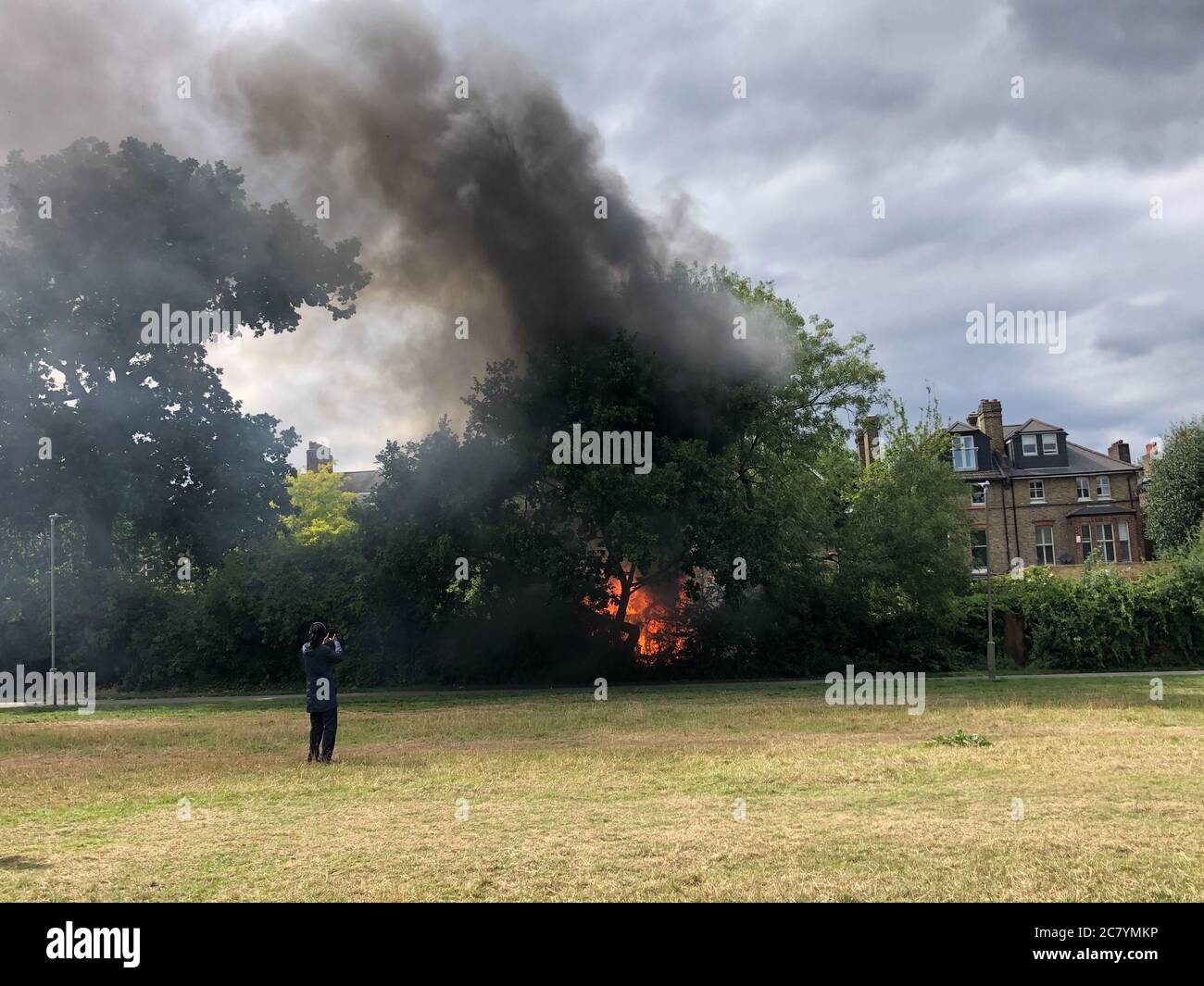 London, UK. 19th July 2020; Tooting Common Fire - Firefighters tackle promptly Credit: Jonny Abbas/Alamy Live News Stock Photo