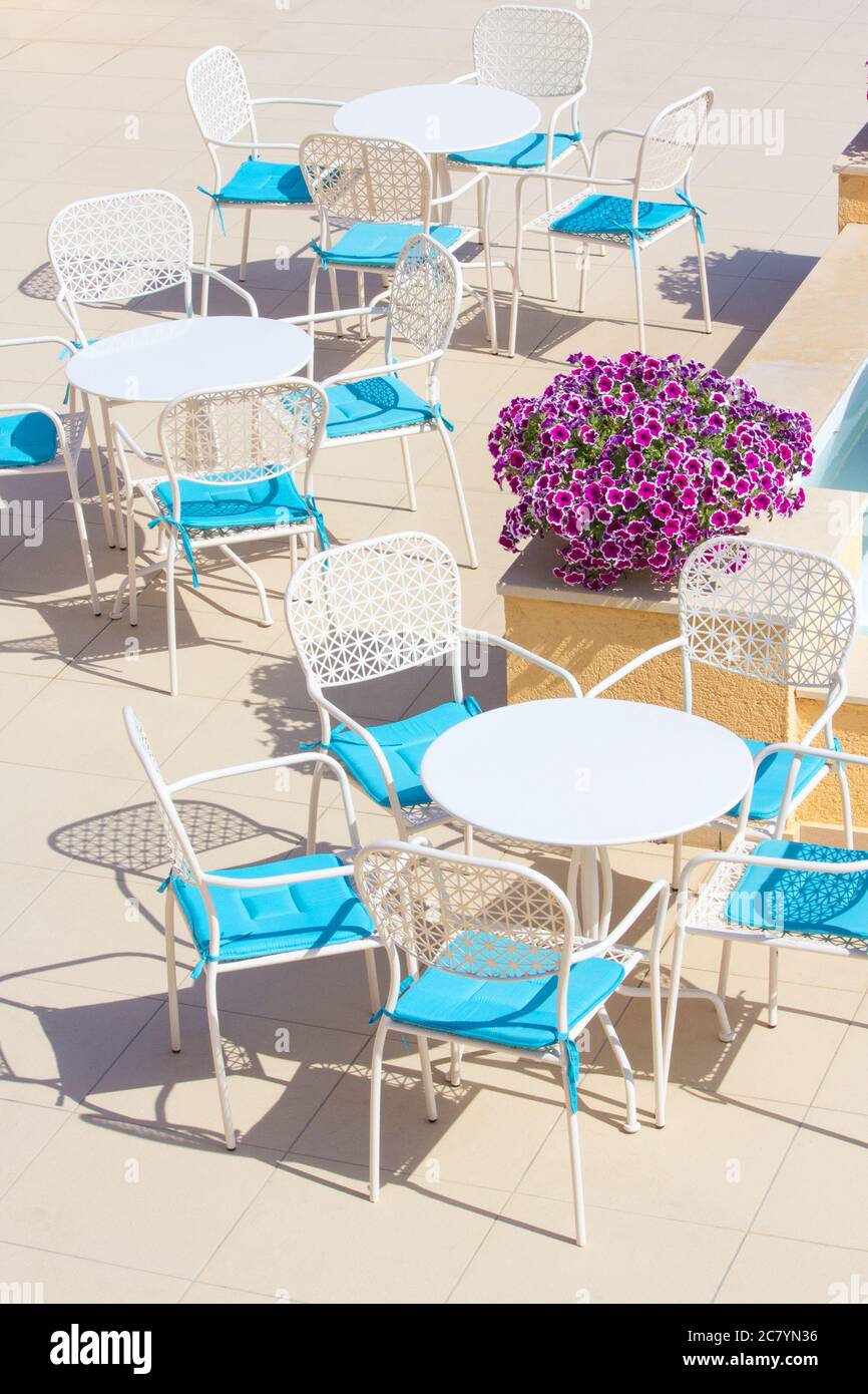 tables and chairs in outdoor terrace cafe Stock Photo