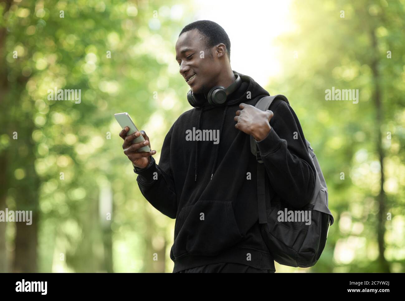 Smiling african american sportsman using hi-res stock photography and ...