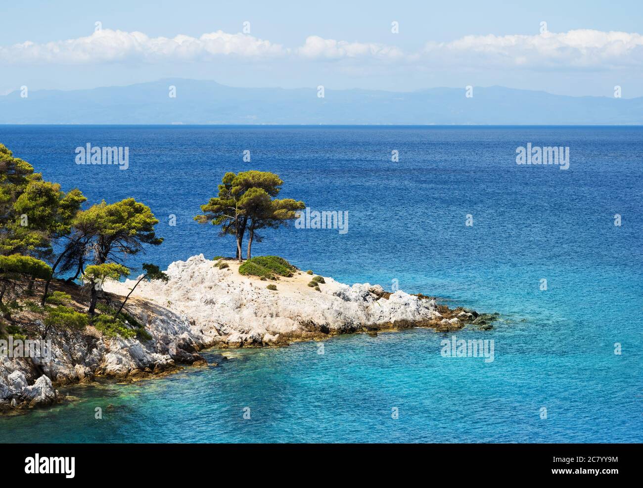 Two trees stand on the picturesque cliff at Cap Armando on the island of  Skopelos, which was the location of the musical Mamma Mia Stock Photo -  Alamy