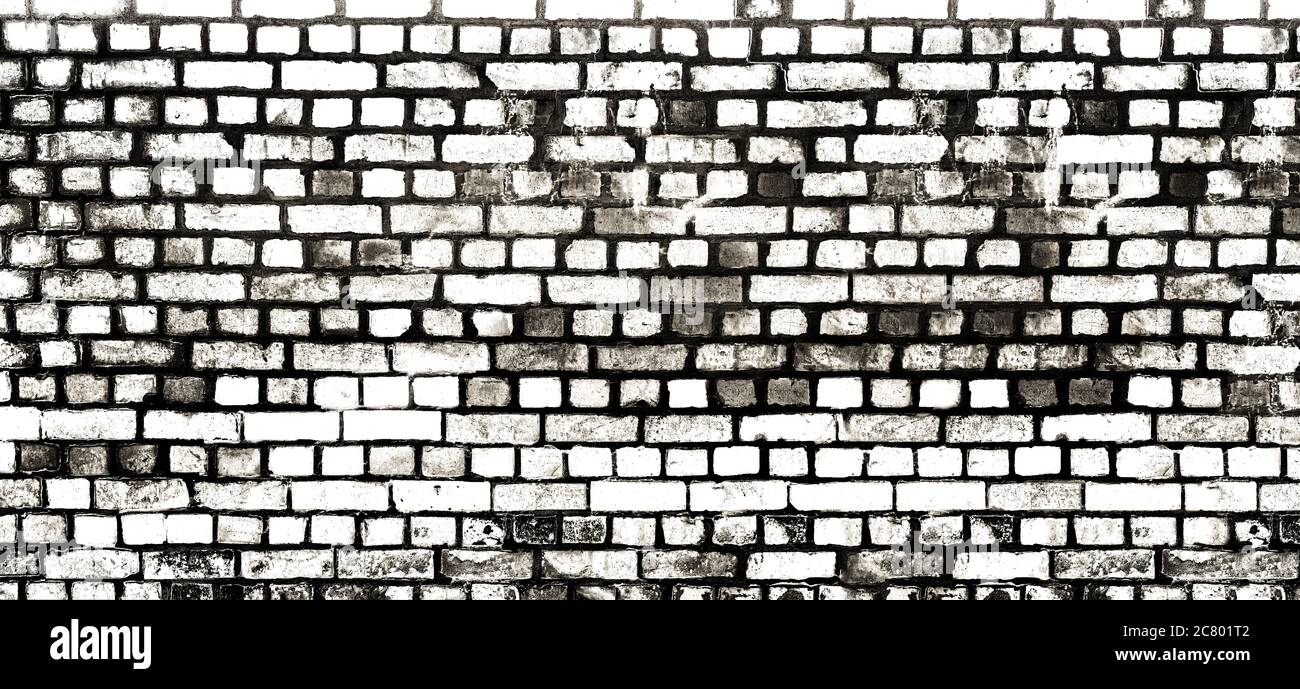 wide black and white stained and aged brick wall background Stock Photo