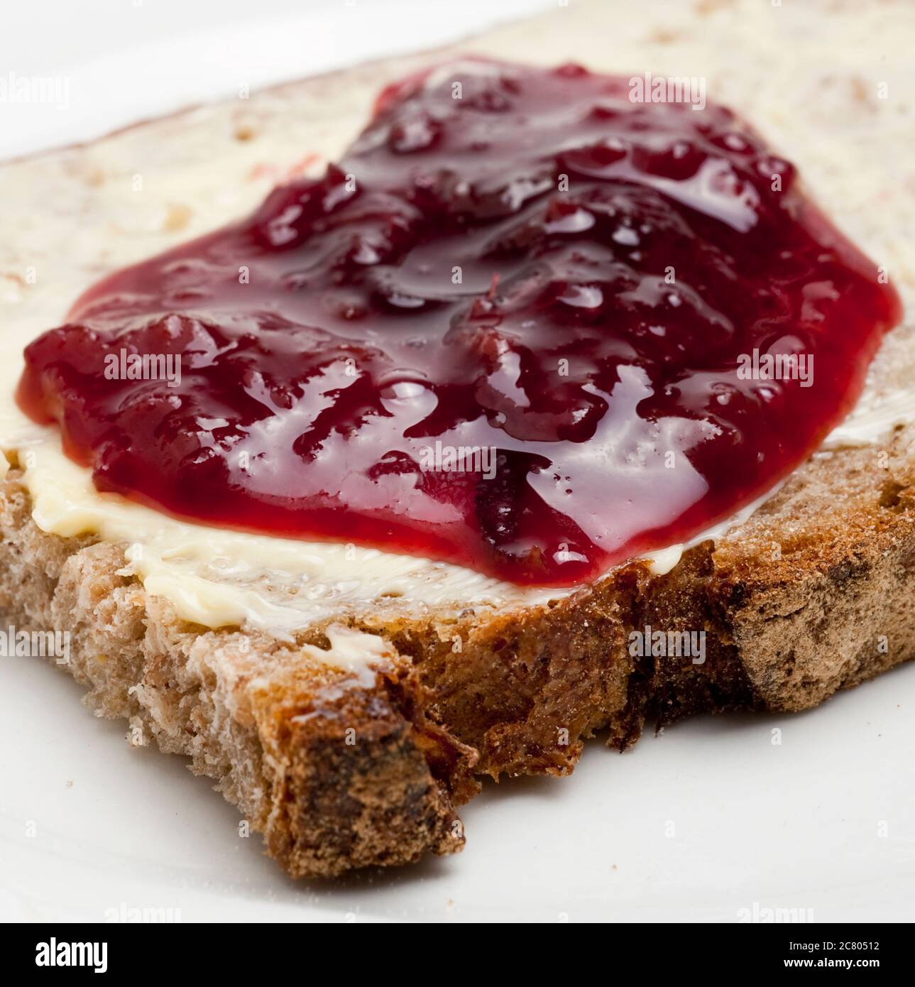 Thick Layer Of Jam And Butter Spread On Bread For Breakfast Stock Photo Alamy Thick Layer Of Jam And Butter Spread On Bread For Breakfast Stock Photo Alamy