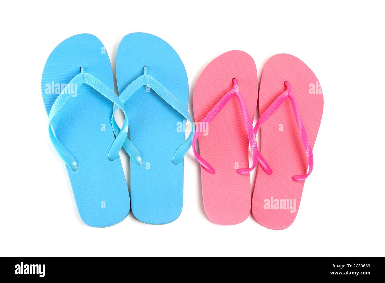 male and female flip flops over white background Stock Photo - Alamy