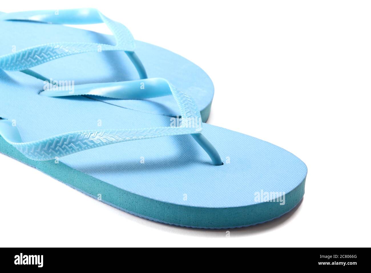 picture of blue summer flip flops over white background Stock Photo - Alamy